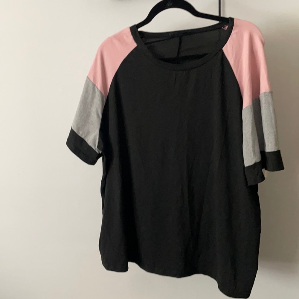 Black top with pink and gray sleeves
